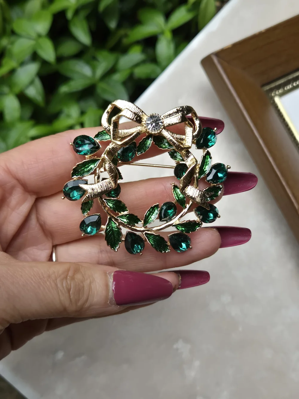 Napier Gold Tone Wreath Brooch with Emerald Green Stones